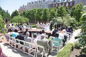 Outdoor Wedding Ceremony In Moxley Garden Waterfront Wedding Venue Cheap Wedding Venues Backyard Wedding