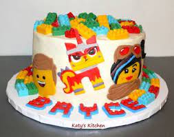 Back in 1950s, when the denmark based company lego introduced the 'automatic binding bricks' they never thought that no wonder that every now and then kids demand to have a lego themed birthday party. Lego Movie 2 Cake Lego Movie Cake Lego Movie Birthday Movie Cakes
