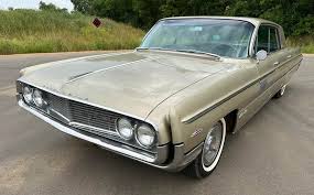 Image result for Sand Beige 1962 Oldsmobile