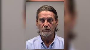 Man arrested for breaking and entering Dayton motel through window