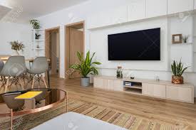 See more ideas about interior design, interior, decor. Interior Of Contemporary Living Room With Tv On The Wall Stock Photo Picture And Royalty Free Image Image 132309182