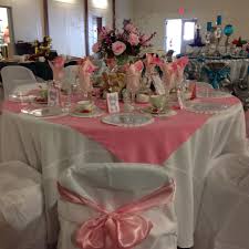 Pink Tablescape With White Self Tie Chair Covers And White Tablecloths In Satin Top With Pink Overla Dream Wedding Decorations Pink Tablecloth Pink Tablescape
