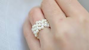 Make sure it's tight now your flower should be done. How To Make A Continious Bead Daisy Flower Ring Or Bracelet Youtube