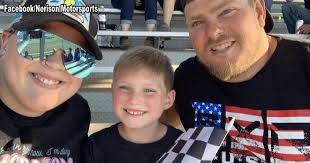 Eau Claire family chasing checkers, dreams