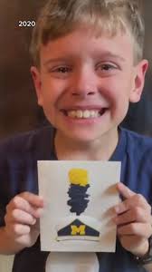 11-year-old boy invited to march with University of Michigan marching band 