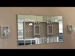Small mirrors can be used together to create unique patterns set off by lighting. Dollar Tree Diy Glam Wall Mirror And Sconces Bmichellepar Gmail Com 20 5 Inch Square Mirrors 3 Frames With Diy Mirror Diy Dollar Tree Decor Dollar Tree Decor