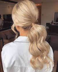 Low messy knots for short hair. 50 Best Ponytail Hairstyles To Update Your Updo In 2020