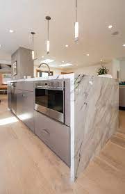 Shaker kitchen in fossil grey £1,228 * or only £15.03 * per month. Wasserfall Kucheninsel Google Suche Wasserfall Kucheninsel Google Sear Waterfall Island Kitchen White Marble Countertops Kitchen Countertops