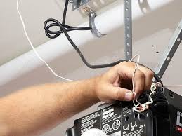 Hook up the wiring from the unit to the push button control next to the home entry door. Garage Door Opener Repair Chicago Premium Garage Door Repair