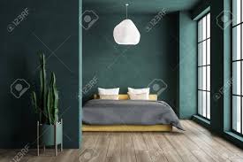 Deeper hues such as black and navy offer bold contrast to the muted walls and light wood finishes. Yellow Green Bedroom Design
