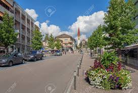 Wallisellen, Switzerland - 6 September, 2014: View Along The Bahnhofstrasse  And Kirchstrasse Streets With The Protestant Church