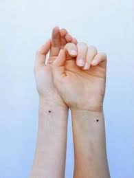 Red heart flower wrist tattoo. 42 Romantic Heart Wedding Tattoos Weddingomania