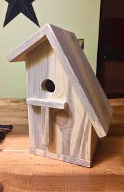 Step 13 holding the roof down, pick up the entire birdhouse and carefully turn it over so. Spacious Pine Slanted Roof Birdhouse The Skaarsgard Collection Birdhouseideas Birdhousepla Wooden Bird Houses Bird Houses Ideas Diy Homemade Bird Houses