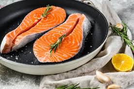Raw Salmon Steak In A Frying Pan Healthy Seafood Top View In 2020 Salmon Steak Healthiest Seafood Cooking Salmon