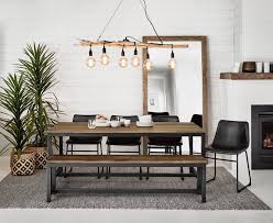 Rugs Under Dining Tables Expert Tips Ideas Tlc Interiors Rug Under Dining Table Dining Table Rug Dining Rug