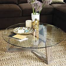 Ion Glass Round Coffee Table West Elm Canadians The Osaka Coffee Table At Urban Barn Is Very Similar In Design To This Round Glass Coffee Table Decorating Coffee Tables