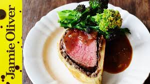 Remove the puff pastry from the fridge and brush the whole sheet with a beaten egg yolk. Beautiful Beef Wellington Jamie Oliver Youtube