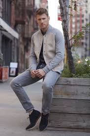 This Men S Baseball Jacket With Faux Sherpa Lining Pairs Great With A Patterned Button Down Light Gray Denim Pants A Baseball Jacket Mens Outfits Mens Jackets
