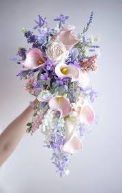 What kinds of flowers are most appropriate for a wedding. 4 Easy And Cheap Diy Ideas September Wedding Flowers Floral Wedding Flowers Grey Textur Purple Wedding Bouquets Wedding Flower Guide September Wedding Flowers