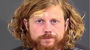 Columbia man charged with slashing tires