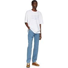 Although margiela no longer actively heads the company, the line continues to push the boundaries of contemporary fashion. Maison Margiela White Number Logo T Shirt Maison Margiela