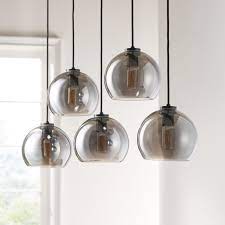 Arren Black Linear 5 Light Pendant With Silver Round Shades Crate And Barrel Pendant Lighting Silver Rounds Pendant Light Fixtures