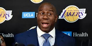 How Magic Johnson's Management Style Differs From Bill Parcells'