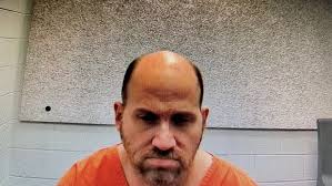 Suspect in drug investigation tied to police officer's murder receives bond  reduction