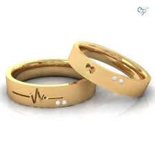 Oversized wedding rings are the new norm in marriages and other the concept of engagement rings has changed in the recent past, apart from the couple bands simple gold ring designs are convenient to match with your attire, uncomplicated, and lend a style. Wedding Rings Couple Ring Design Couple Wedding Rings Couple Rings Gold