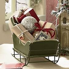 I Have A Collection Of Sleighs I Put On My Dining Room Table Usually I Fill Them With Ornaments Christmas Sleigh Decorations Christmas Sleigh Christmas Sled