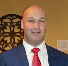 Bear legend's brother among 10 charged in sports-gambling bust