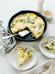 A Moist And Fluffy Italian Egg And Potato Frittata Loaded With Greens And Topped With Creamy Ricotta Cheese Potato Frittata Ricotta Cheese How To Cook Potatoes