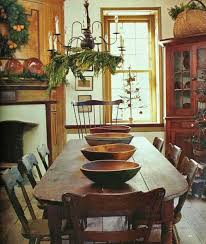 Decorating your home for the holidays is such a fun process. Decorating In The Primitive Colonial Style Colonial Home Decor Primitive Dining Room Primitive Dining Rooms