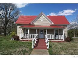 By opting for a very neutral trim that can act as a break between the siding and the roof, you help quiet down the design and stop the contrast from becoming too stark. 14 Red Roof Ideas Red Roof House Exterior House Colors