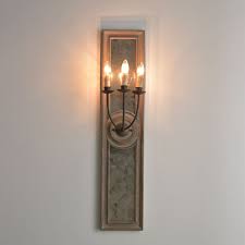Wall sconce can be found on the wall of the house. French Candle Wall Sconce 3 Light Mirrored Wall Light Weathered Wood Panel Metal In 2021 Wall Candles Wall Lights Wall Sconces