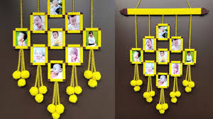 Easy Beautiful Wall Hanging Photo Frame Using Cardboard And Woolen D In 2020 Wall Hanging Photo Frames Wall Hanging Crafts Hanging Photos