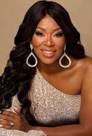 Ambassador program leader with gumboots and a smile