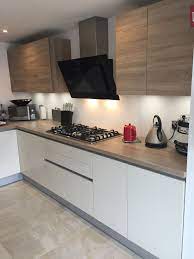 A solid oak worktop might seem to be a traditional choice, but the worktops thickness will determine the pieces overall style. Real Kitchen Inspiartion Lumina Mussel And Sierra Bardolino Oak With Sonoma Oak Worktops Kitchen Design Oak Kitchen Worktops Small Modern Kitchens