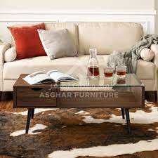 This crisscrossed x polished stainless steel base provides sturdy support to the lower tempered glass shelf of this coffee table. Mansel Glass Top Coffee Table Asghar Furniture Shop Furniture Online Dubai Abu Dhabi Ajman Sharjah