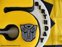 Press it down a little so it sticks to the cake. Transformers Birthday Cake Giveaway Elizabeth S Kitchen Diary