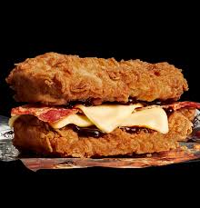 It has two pieces of fried chicken fillet instead of the typical bread, containing bacon, cheese, and sauce. Double Down Burger Is Back Limited Time Only Kfc