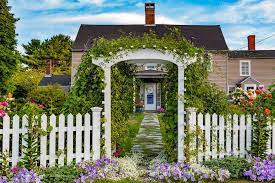 White picket fences are somewhat iconic in the us and beloved by many homeowners. These Garden Fence Ideas Are Both Practical And Pretty Fence Landscaping Backyard Fences Landscaping Along Fence