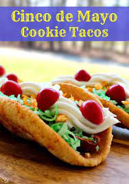 Visit this site for details: Dessert Taco Cookies For Cinco De Mayo Celebrate The 5th Of May With These Easy To Make Spicy Cookie Taco Dessert Taco Cinco De Mayo Desserts Mexican Dessert