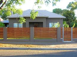The fence encloses the territory. Fences Spaced Interior Design Ideas Photos And Pictures For Australian Homes Modern Fence Design Modern Front Yard Fence Design