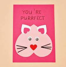 Using the scraps of paper from your cat's main color, cut out small strips of paper for the whiskers. Diy Valentine Cat Card Super Cute Valentine Craft For Kids