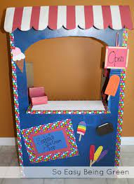 Diy Cardboard Playhouse Ice Cream Shop From A Big Cardboard Box Play Ice Cream Cardboard Box Crafts Diy Ice Cream