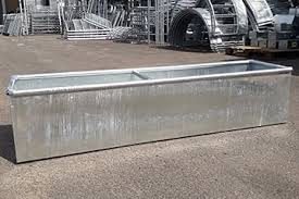 This large circular drinking trough holds over 2000 litres and has low drinking height so animals can reach the water easily. Water Trough J Hubbard Son Ltd