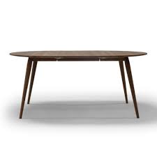 This coffee table is made with laminated bent plywood. Bruunmunch Play Round Dinner Table Extendable Palette Parlor Modern Design