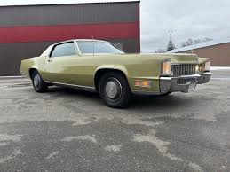 Image result for Medium Gold 1969 Cadillac