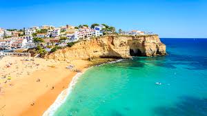 Beaches in portugal are often set against a backdrop of colorful rugged cliffs that provide a natural shelter from troublesome winds. July In Portugal Weather And Event Guide